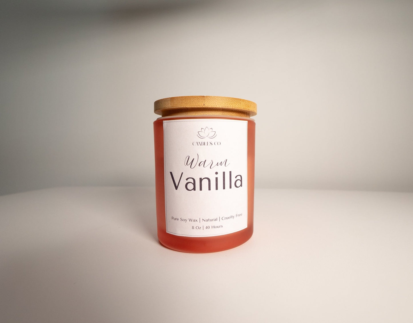 8 oz Soy Wax Candle in a Frosted Pink Jar with Bamboo Lid - Candles Co.