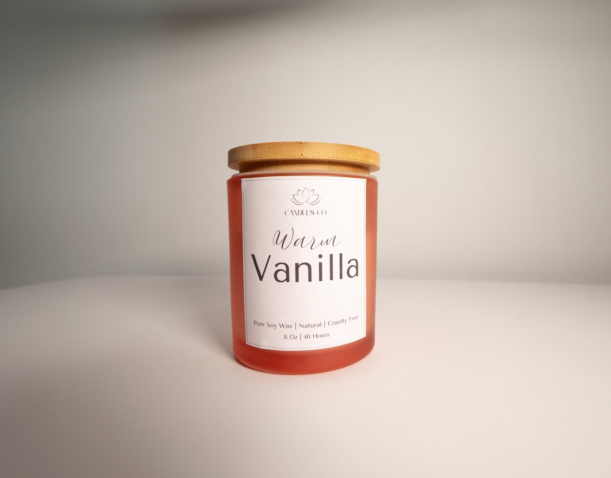 8 oz Soy Wax Candle in a Frosted Pink Jar with Bamboo Lid - Candles Co.